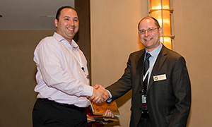 Alain Cloutier presents award